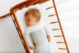 Saco de dormir de manga larga Swaddelini Grey Arms Out™ - Bambi Baby
