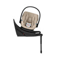 Almond Beige CYBEX Aton G2 Swivel Infant Car Seat with Load Leg Base - Side View | Bambi Baby