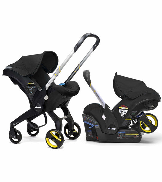 Silla de auto infantil Doona con base en color negro- Bambi Baby