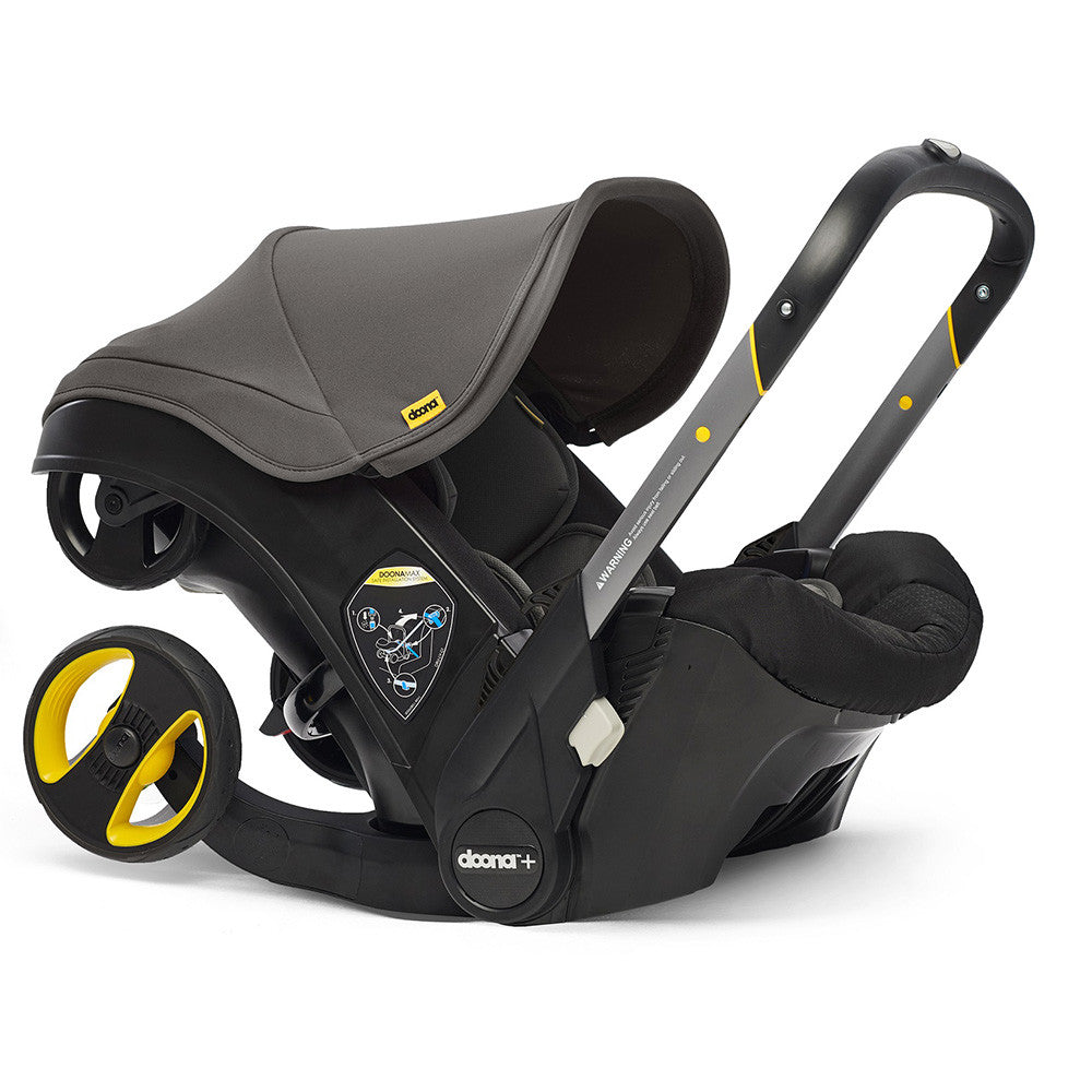 Doona Infant Car Seat Stroller with Base- Bambi Baby