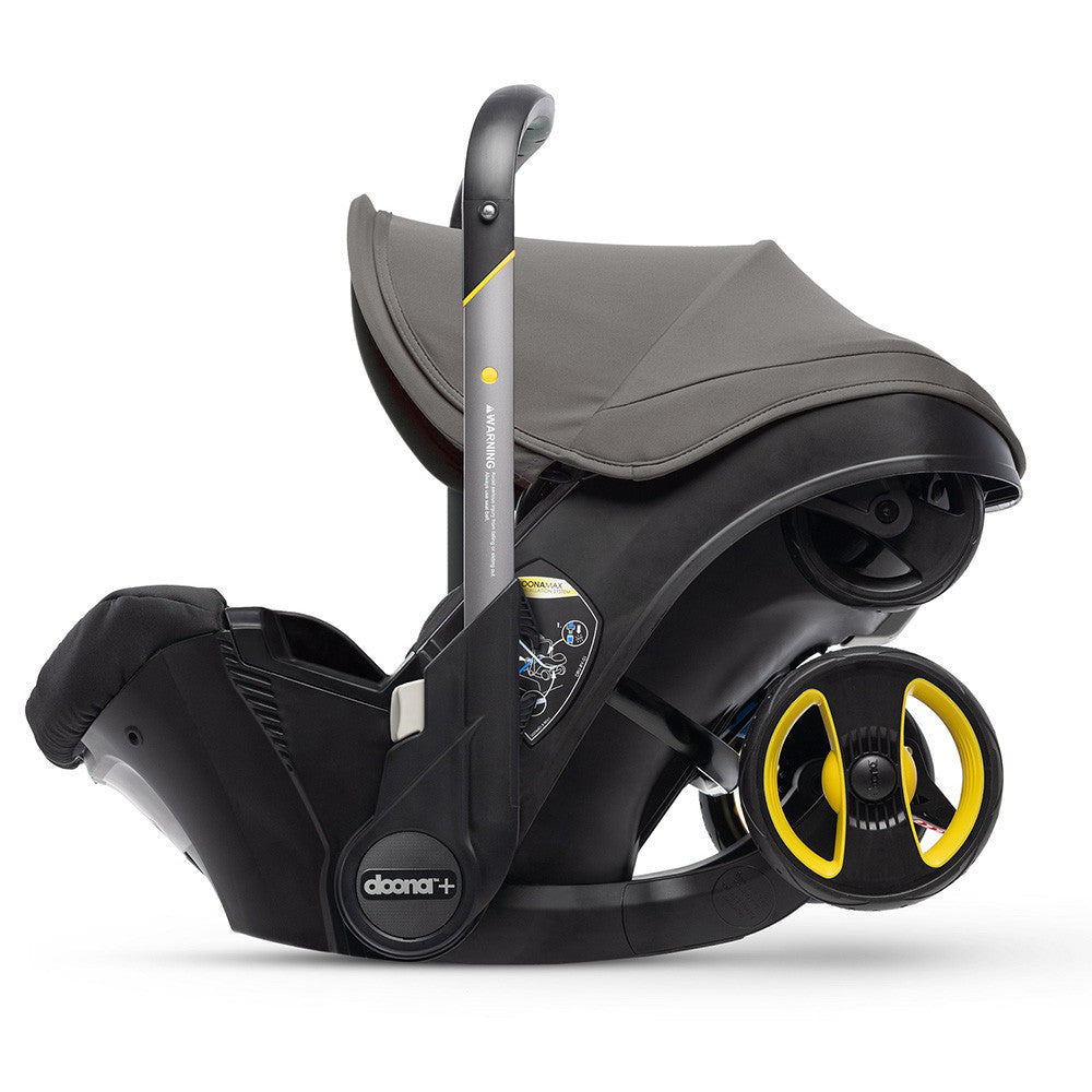 Doona Infant Car Seat Stroller with Base- Bambi Baby