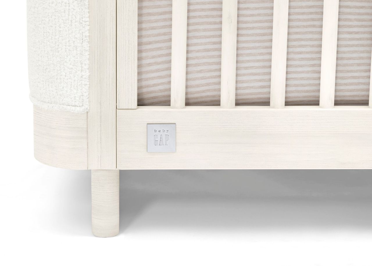 babyGap by Delta Children Callie 4-in-1 Upholstered Convertible Crib- Bambi Baby