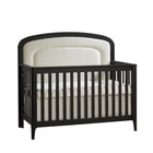 Dusk Black Natart Palo Convertible Crib with Boucle Beige Upholstered Panel - Front View | Bambi Baby